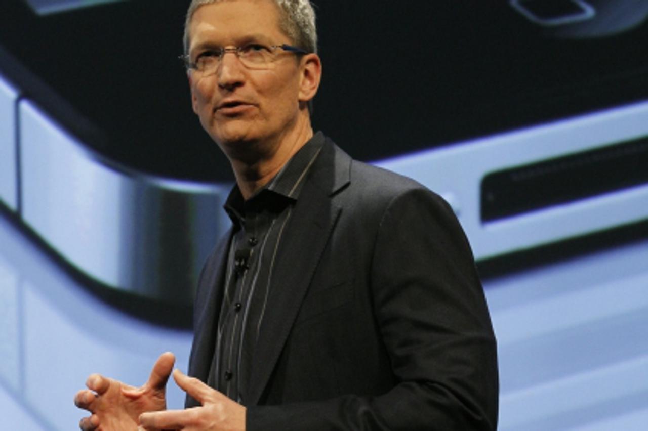'Apple\'s Chief Operating Officer Tim Cook speaks during Verizon\'s iPhone 4 launch event in New York in this January 11, 2011 file photograph. Cook has been named Apple\'s new CEO after current CEO S