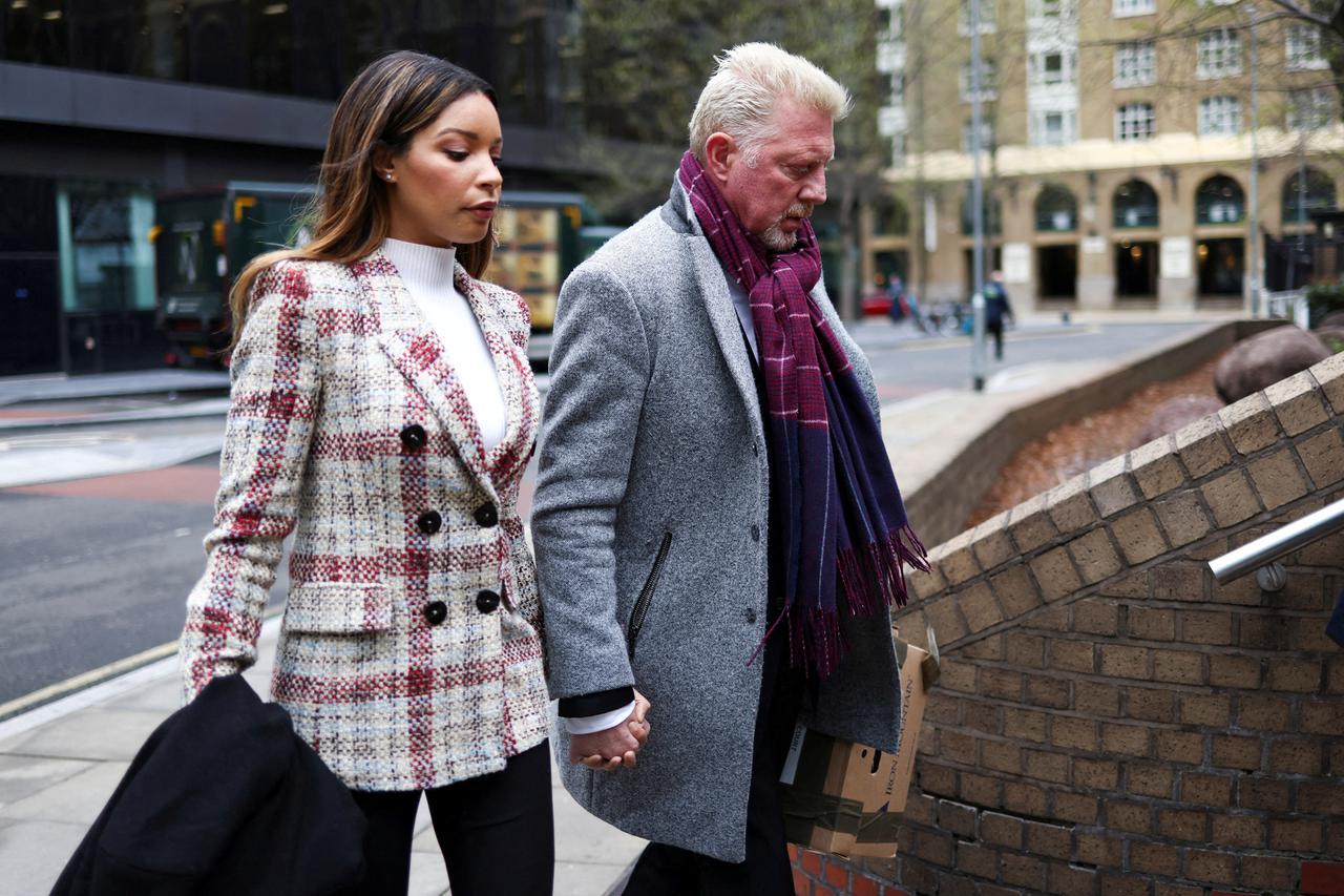 Former tennis player Boris Becker arrives with his partner Lilian de Carvalho Monteiro at Southwark Crown Court for his bankruptcy offences trial in London
