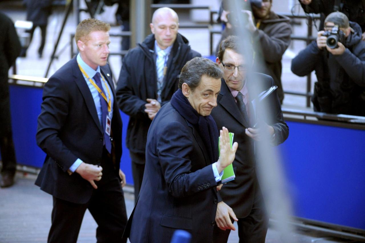 'France\'s President Nicolas Sarkozy arrives at a European Union summit in Brussels December 9, 2011. EU leaders agreed stricter budget rules for the euro zone on Friday, but failed to secure changes 