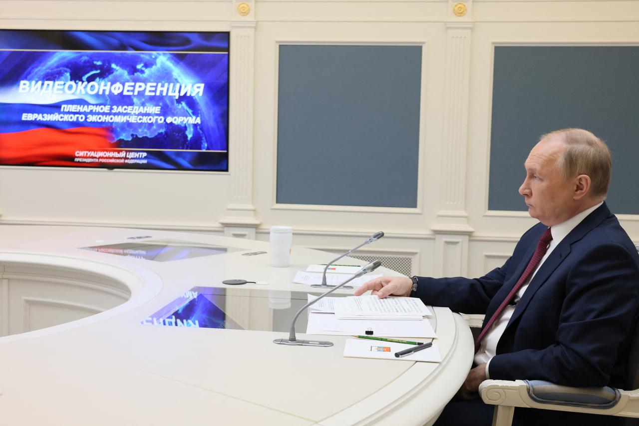 Russian President Vladimir Putin attends the plenary session of the First Eurasian Economic Forum, via video link from Moscow