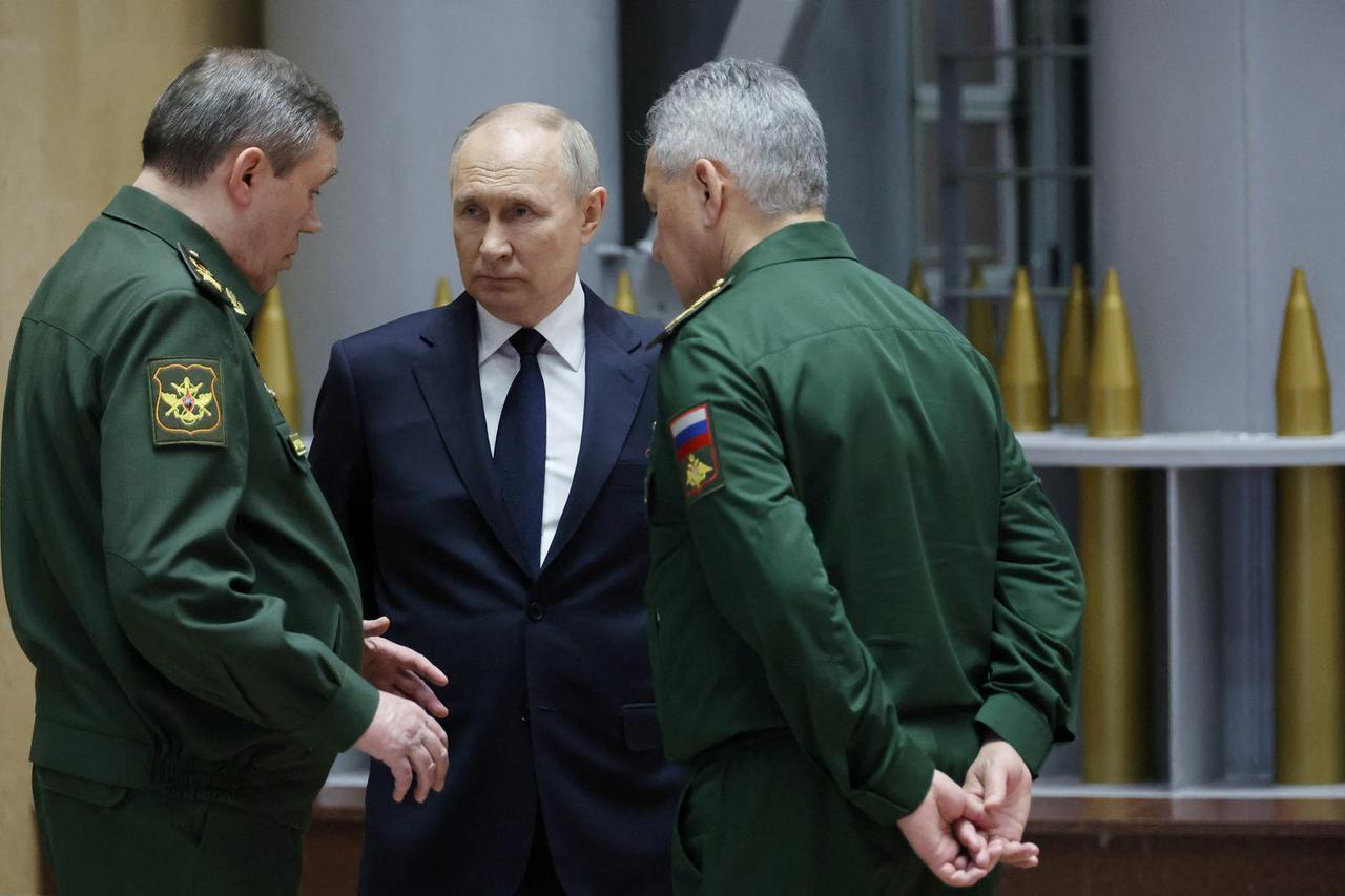 Russian President Vladimir Putin attends an expanded meeting of the Defence Ministry Board in Moscow