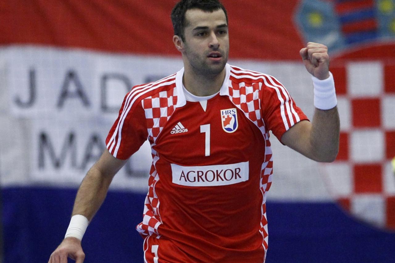 'Croatia\'s Vedran Zrnic celebrates after scoring against Argentina during their main round match at the Men\'s Handball World Championship in in Lund January 22, 2011.     REUTERS/Yves Herman (SWEDEN
