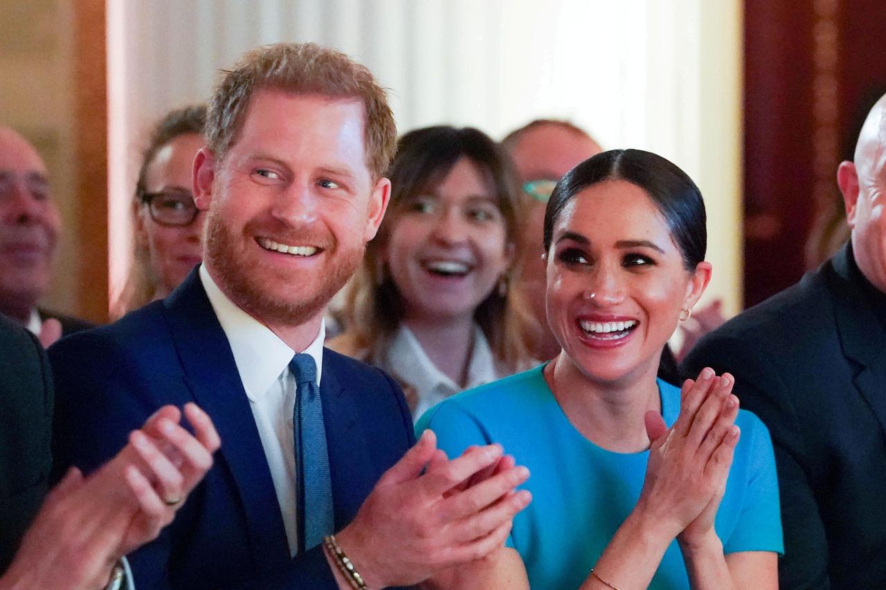 FILE PHOTO: Britain's Prince Harry and Meghan, Duchess of Sussex, attend Endeavour Fund Awards in London
