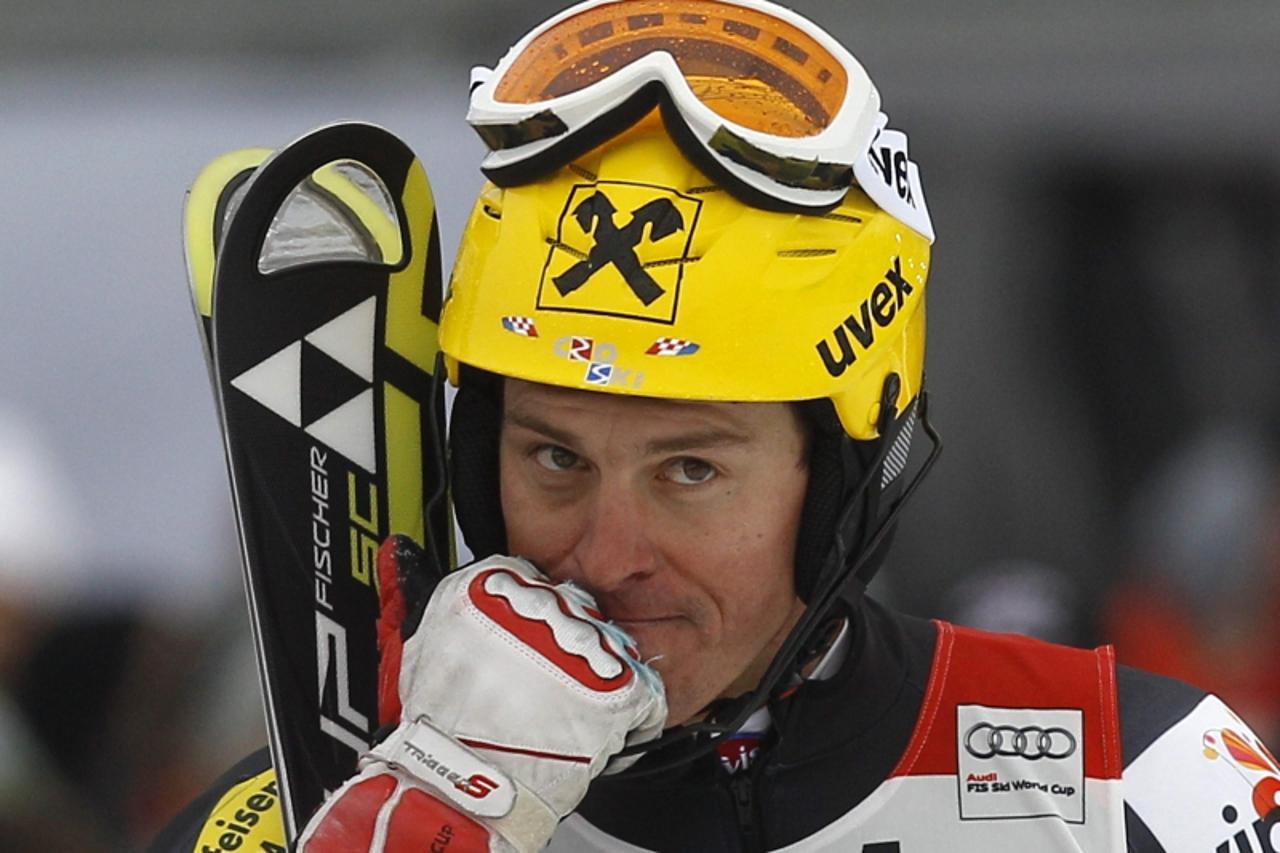 'Croatia\'s Ivica Kostelic reacts in the finish area during the men\'s Alpine Skiing World Cup slalom race in Kitzbuehel January 22, 2012.     REUTERS/Leonhard Foeger (AUSTRIA - Tags: SPORT SKIING)'