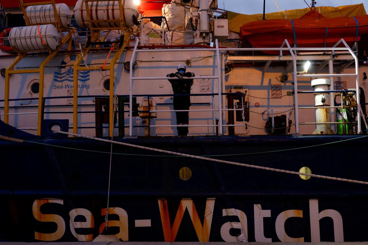 FILE PHOTO: Last group of rescued migrants disembark from migrant rescue ship Sea-Watch 3 in Sicily