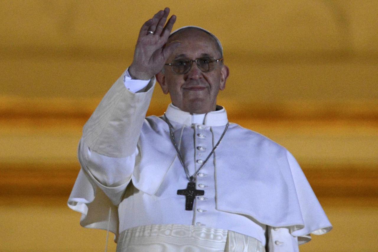 'Newly elected Pope Francis, Cardinal Jorge Mario Bergoglio of Argentina appears on the balcony of St. Peter\'s Basilica after being elected by the conclave of cardinals, at the Vatican, March 13, 201