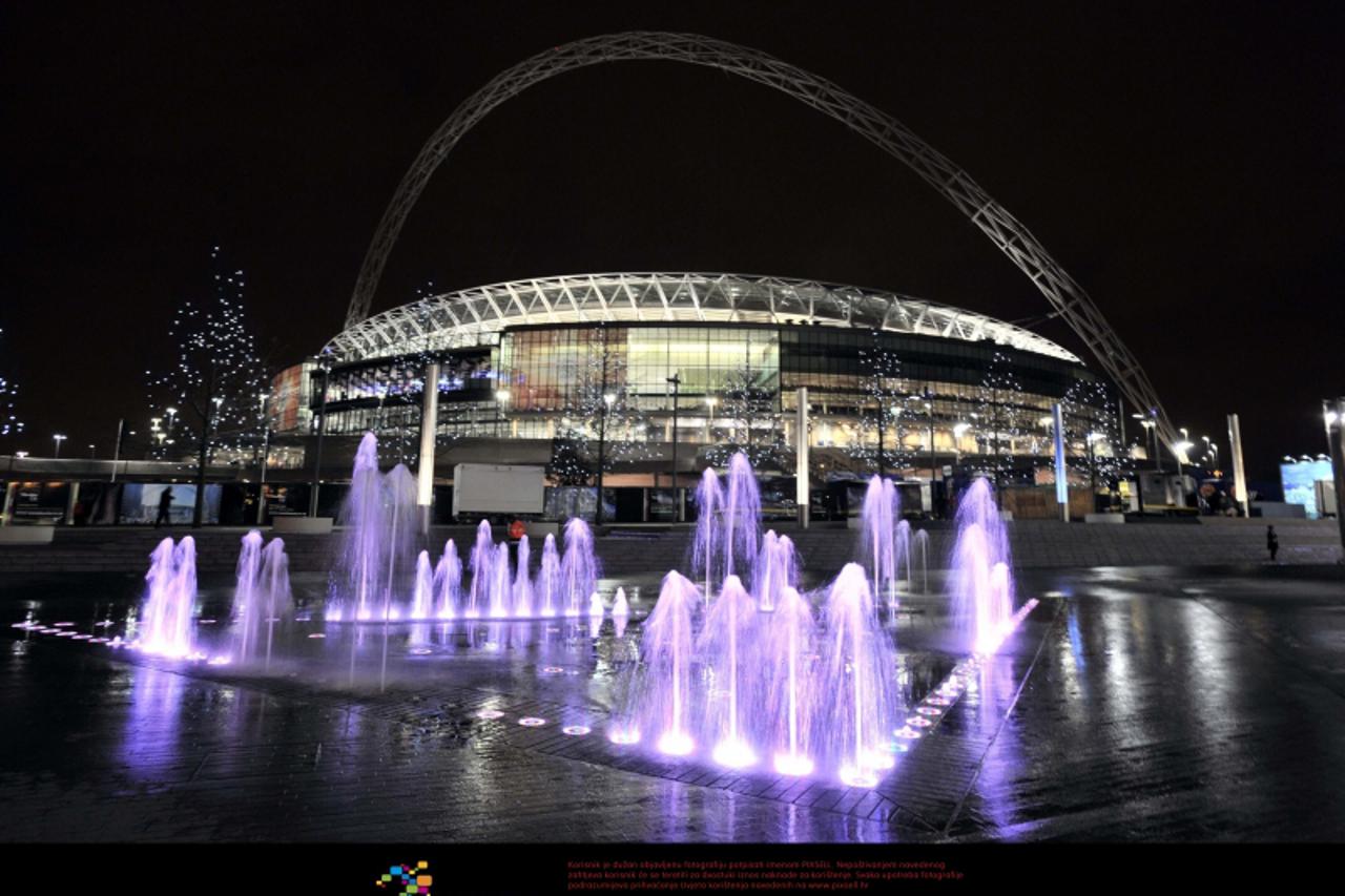'Earth Hour A general view of Wembley Stadium, London, with the arch in the dark after the lights were switched off for Earth Hour.'