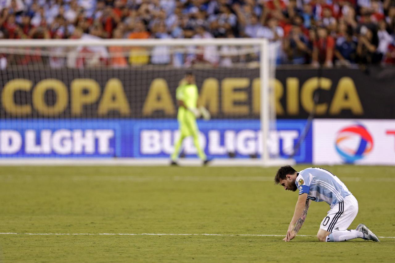 Jun 26, 2016; East Rutherford, NJ, USA; Argentina midfielder Lionel Messi (10) reacts during a shoot out against Chile in the championship match of the 2016 Copa America Centenario soccer tournament at MetLife Stadium. Mandatory Credit: Adam Hunger-USA TO