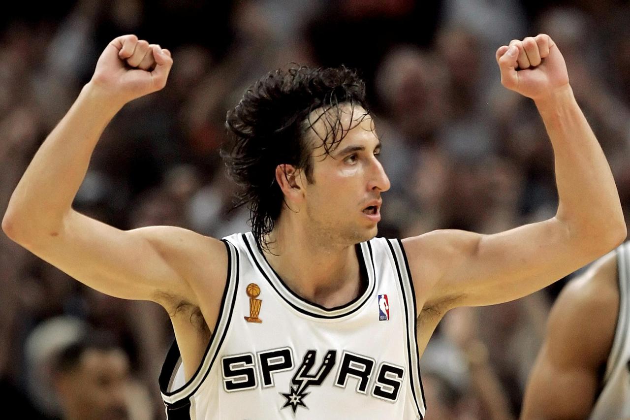 FILE PHOTO: Spurs' Ginobili pumps fists during second half against Pistons in Game 2 of NBA Finals in San Antonio, Texas.