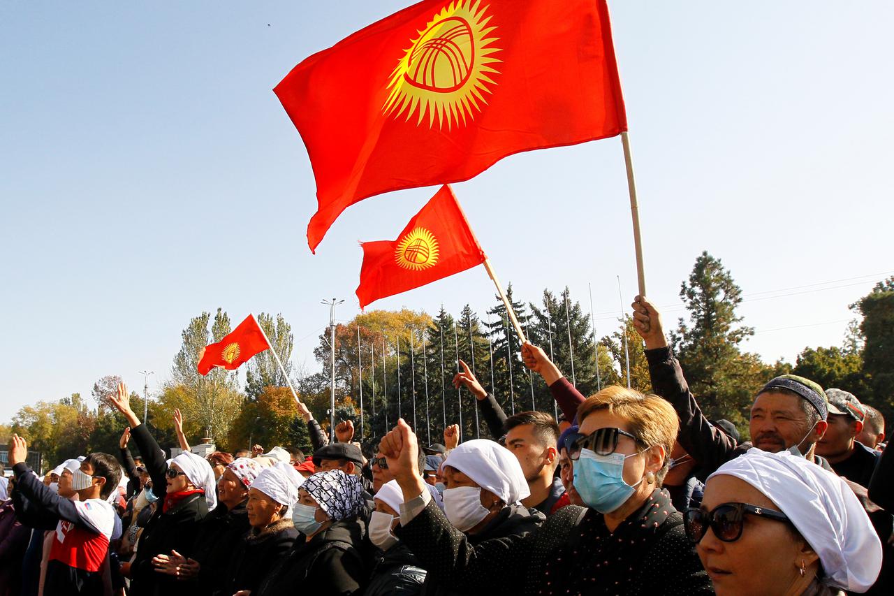 People attend a rally to demand the resignation of President Sooronbai Jeenbekov in Bishkek