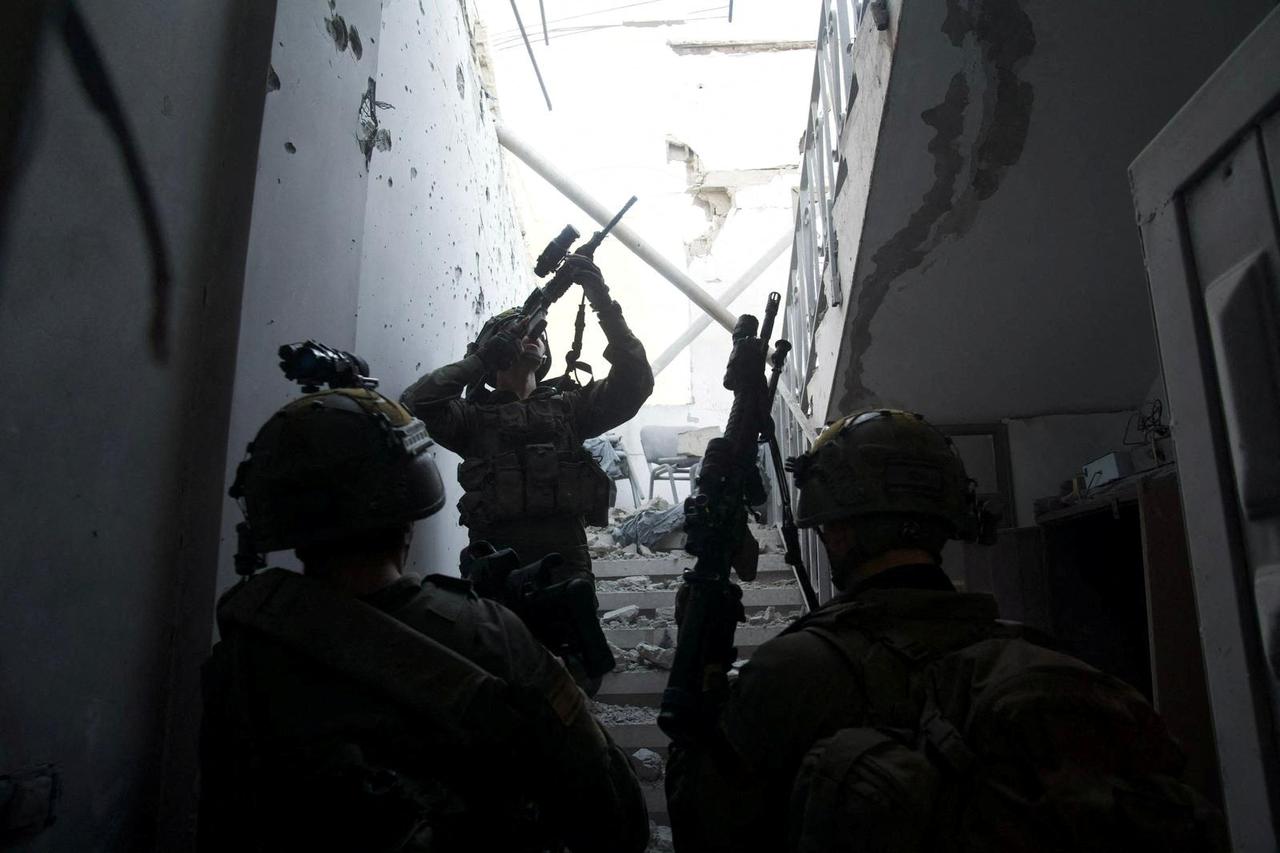 Israeli soldiers take part in a ground operation in Gaza