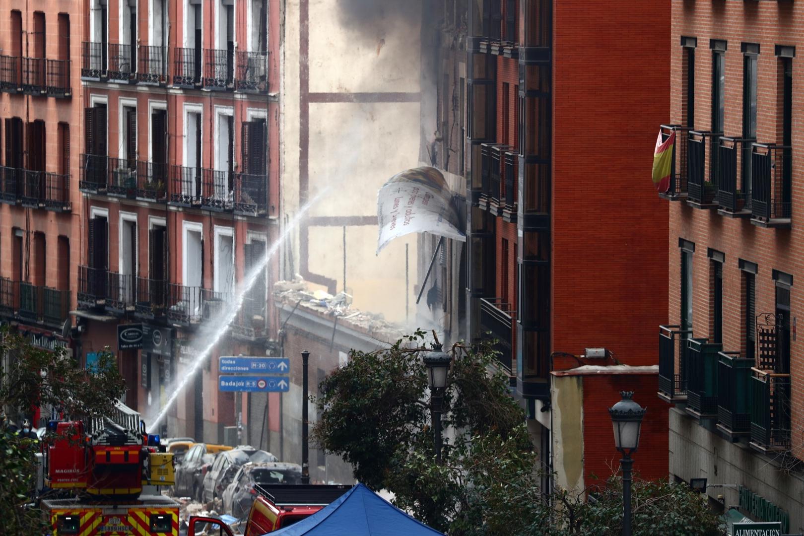 Explosion in Madrid downtown Firefighters spray water on a building belonging to the Catholic Church, following a deadly explosion, in Madrid downtown, Spain, January 20, 2021. REUTERS/Sergio Perez SERGIO PEREZ