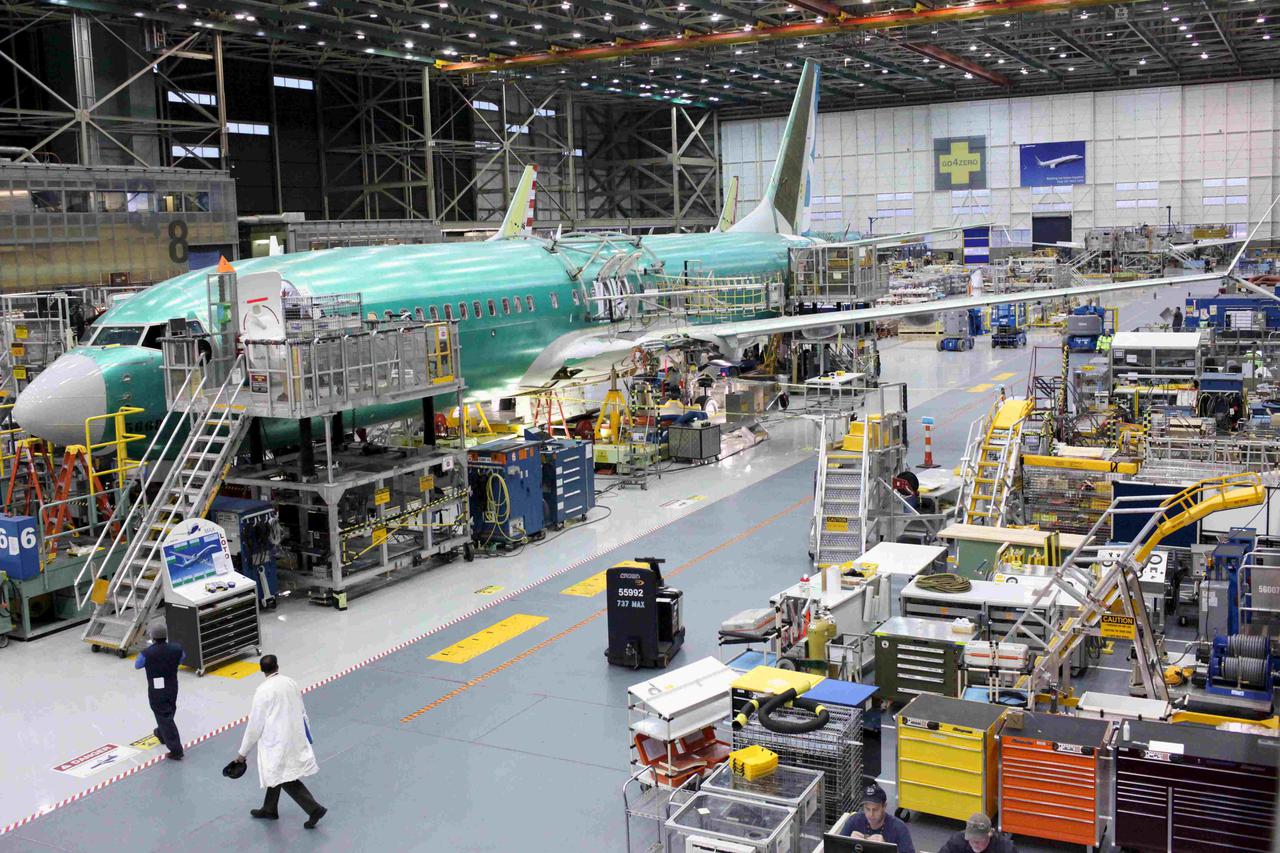A Boeing 737 MAX plane is seen during a media tour at the Boeing plant in Renton, Washington, in this file photo taken December 7, 2015. Factories said new orders held steady at slightly higher levels, though export orders fell. Inventory levels and order