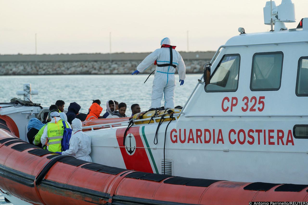 Migrants disembark in Sicily after surviving a deadly shipwreck