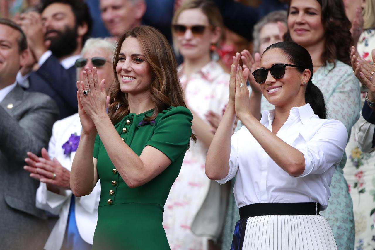 Kate Middleton, the Duchess of Cambridge, Meghan Markle, the Duchess of Sussex and Pippa MIddleton watch the Ladies Singles Final between Serena Williams and Simona Halep at The Wimbledon Championships tennis, Wimbledon, London on July 13, 2019