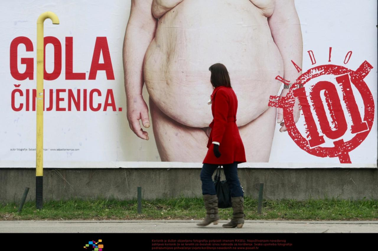 '15.01.2010., Zageb - Jumbo plakat Radija 101 s obnazenim muskim tijelom u Savskoj, kod Horvacanske.  Photo: Marin Tironi/PIXSELL'