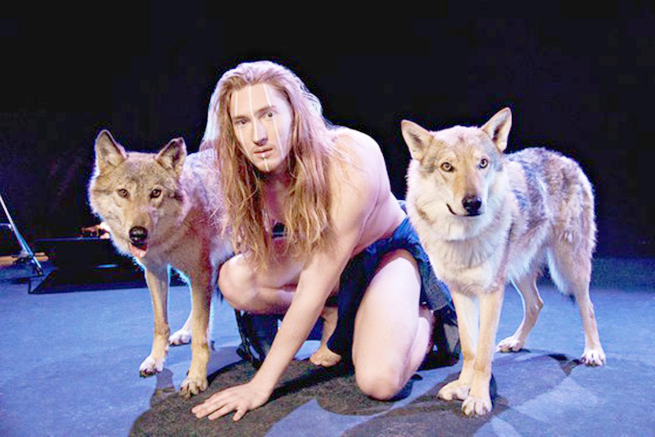 Pic shows: Alexandr Ivanov with wolves. The Belarus representative of this yearís Eurovision song contest has revealed that he plans to appear on stage naked and accompanied by two wolves. The 24-year-old singer Alexandr Ivanov, better known as IVAN, will