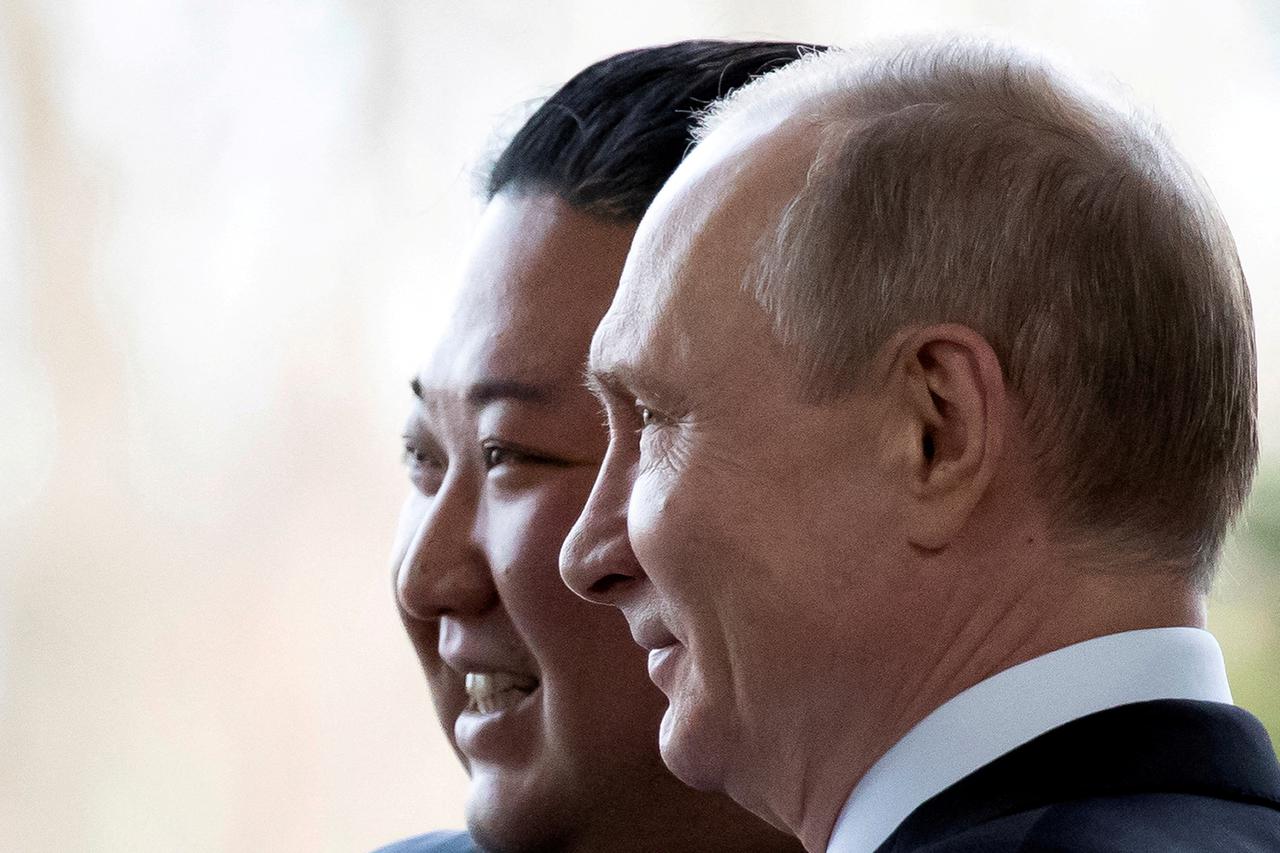 FILE PHOTO: Russian President Vladimir Putin and North Korea's leader Kim Jong Un meet in Vladivostok in 2019