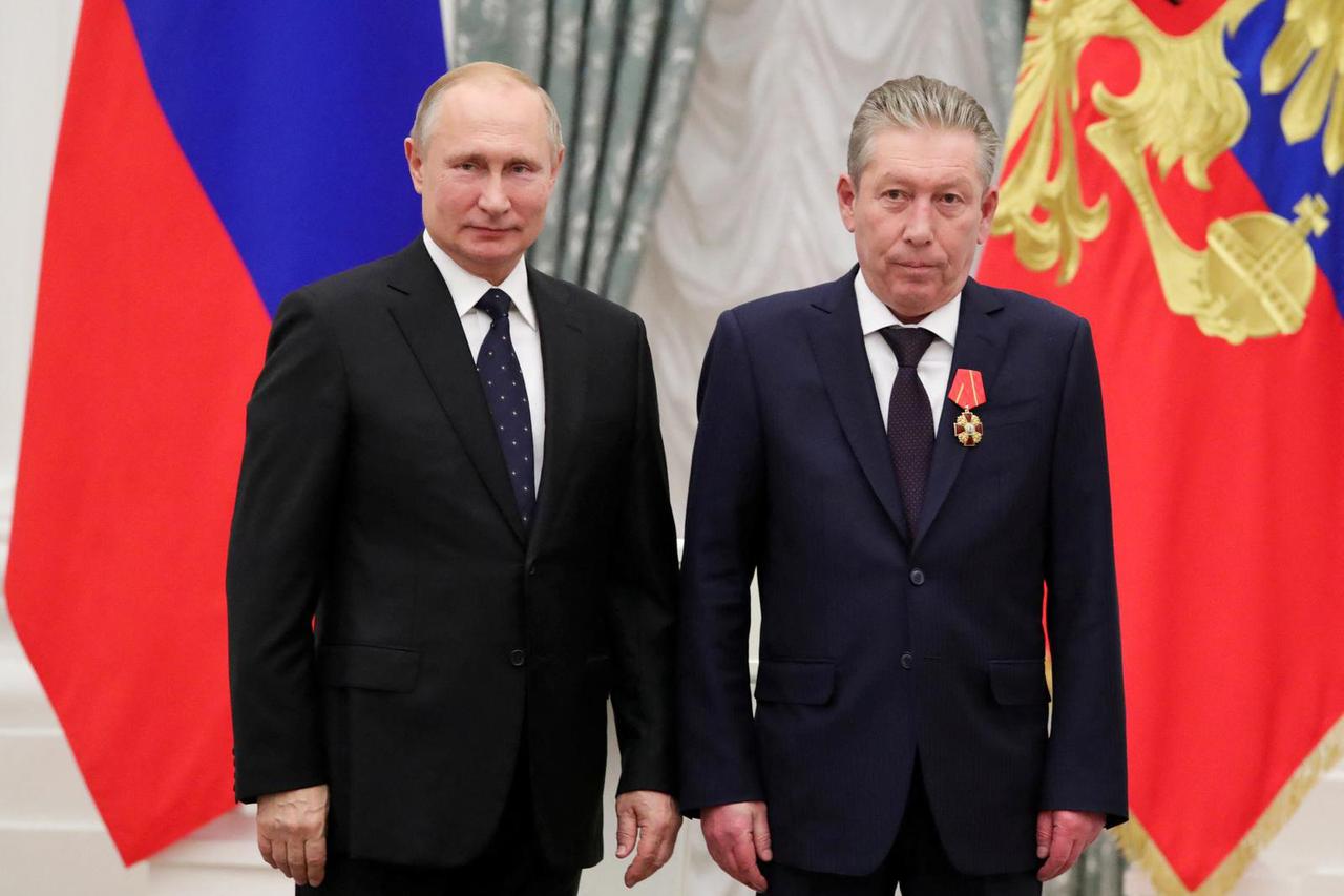 Russian President Putin and Lukoil First Executive Vice President Maganov attend an award ceremony in Moscow