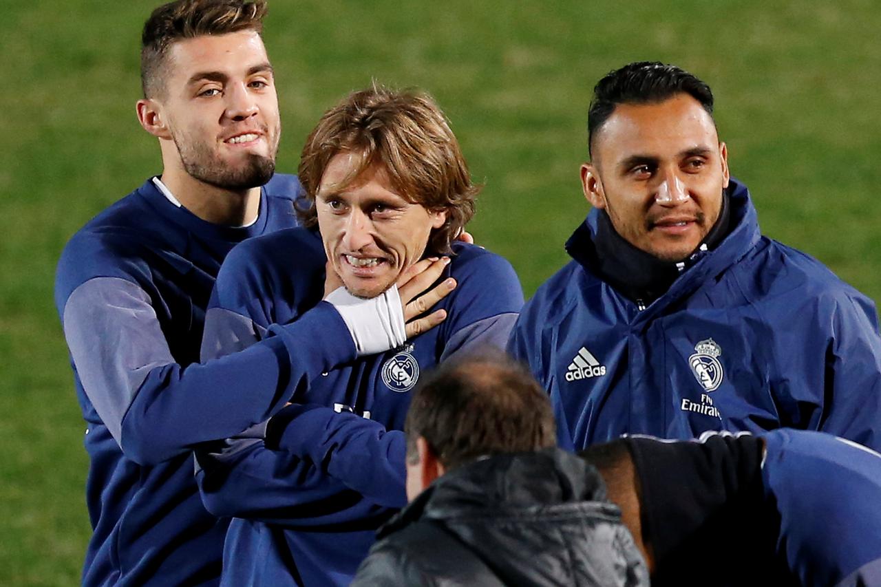 Football Soccer - Real Madrid training - Yokohama, Japan - 16/12/16 - Real Madrid's Luka Modric and other players training ahead of the FIFA Club World Cup Final match against Kashima Antlers. REUTERS/Issei Kato