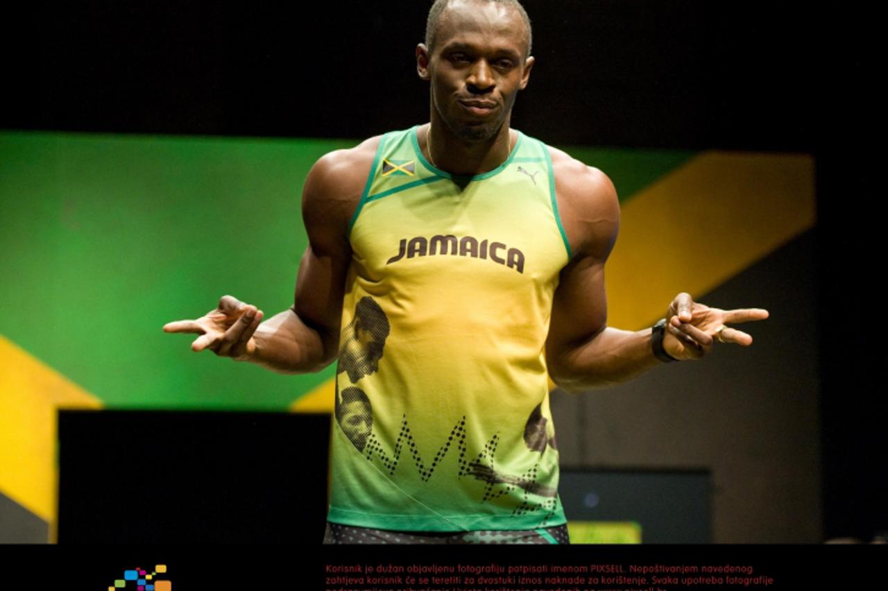 'Jamaican sprinter Usain Bolt wearing the 2012 Jamaican Olympic kit during a photocall at Village Underground, London. Photo: Press Association/Pixsell'