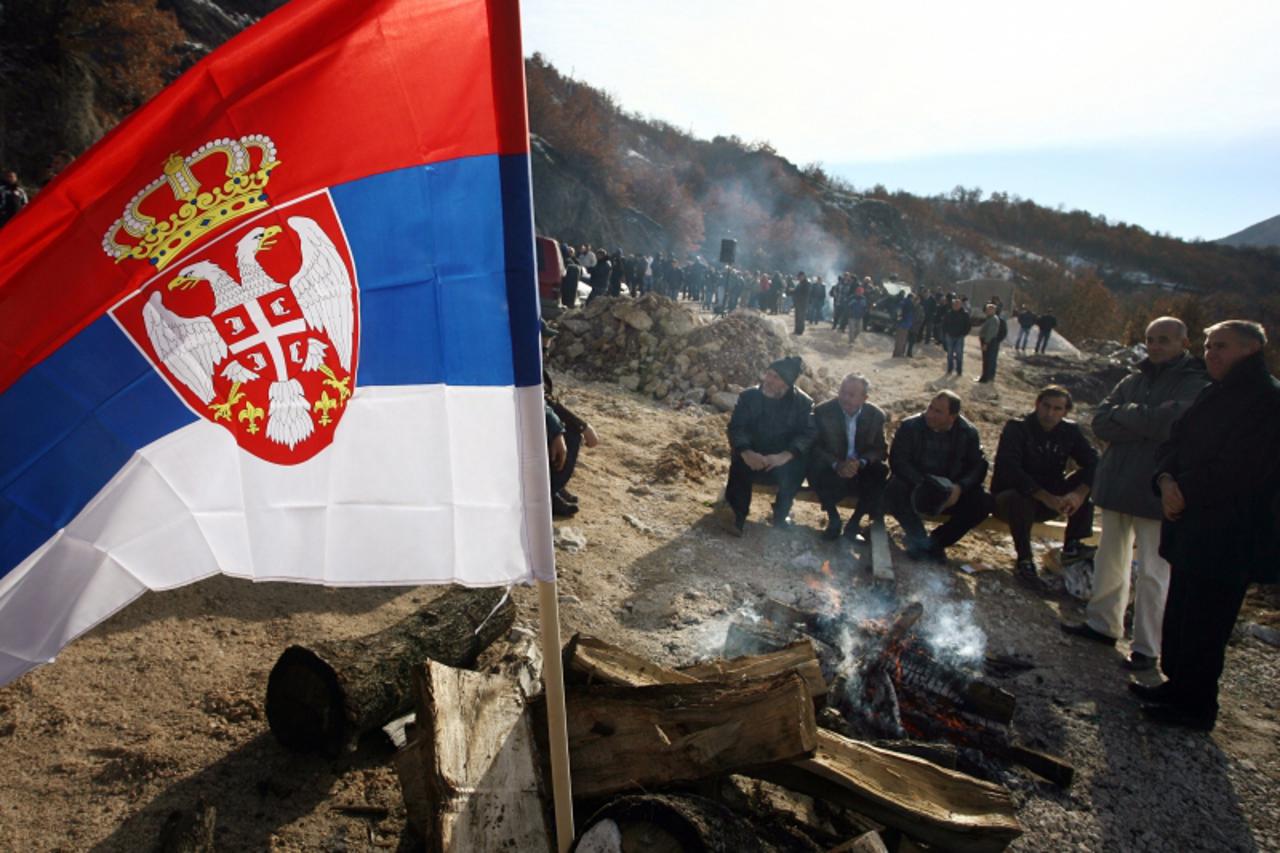 'Kosovo Serbs attend a protest near Serbia-Kosovo border crossing of Jarinje on December 4, 2012. Kosovo Serbs protested against the construction of border crossings between Serbia and Kosovo before l