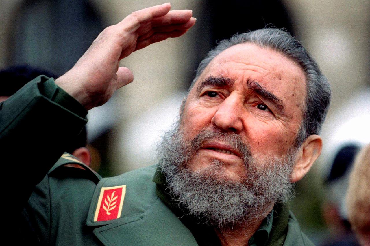 Cuba's President Fidel Castro gestures during a tour of Paris in this March 15, 1995 file photo. Ailing Cuban leader Castro said on February 19, 2008 that he will not return to lead the country, retiring as head of state 49 years after he seized power in 