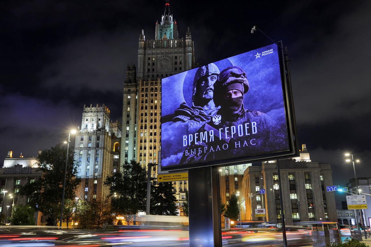 A screen promoting the Russian Army is placed near the Russian Foreign Ministry in Moscow