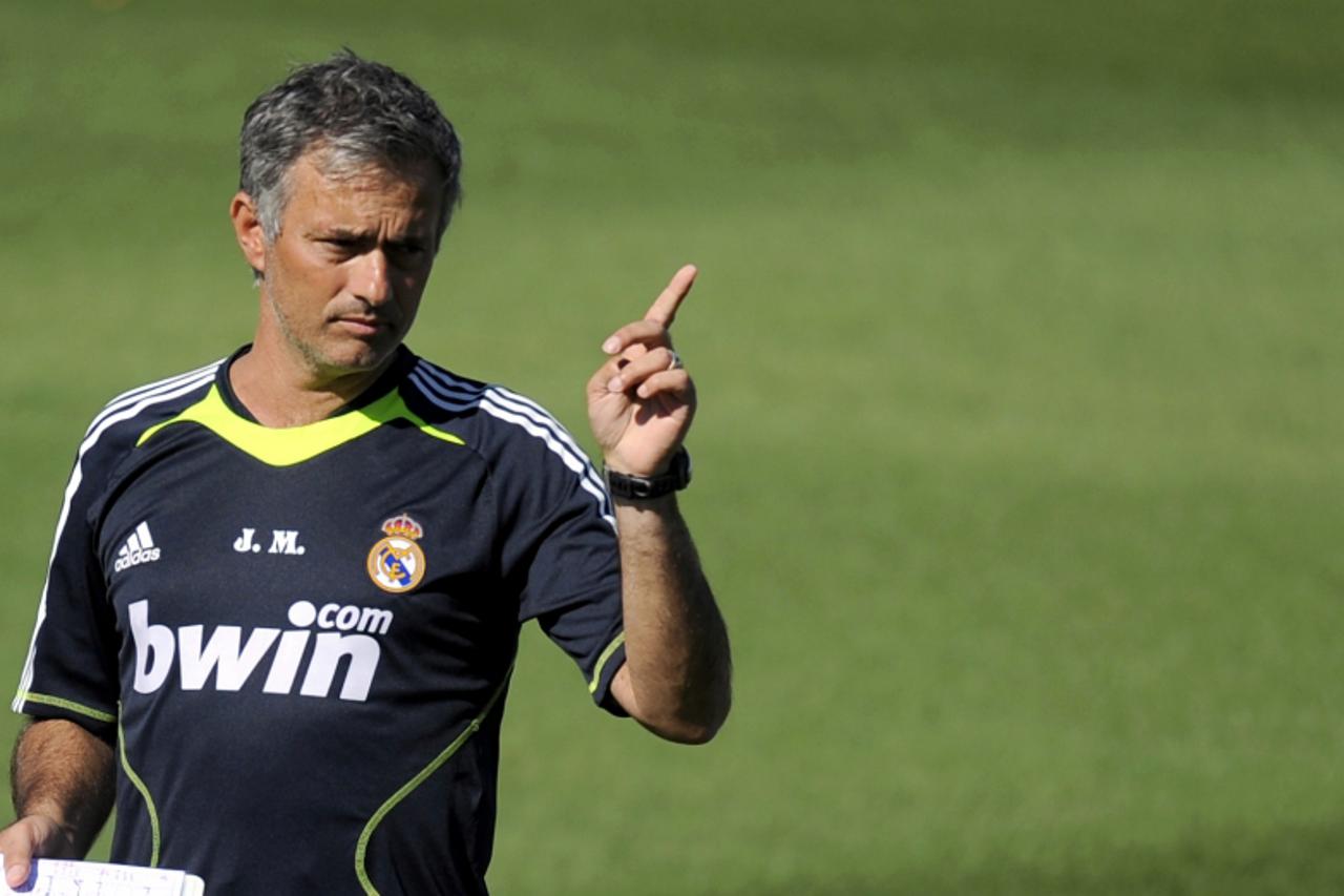 'Real Madrid\'s new coach Portuguese Jose Mourinho attends the team\'s first training session of the season at Real Madrid\'s sport city in Madrid on July 16, 2010. AFP PHOTO / DANI POZO '
