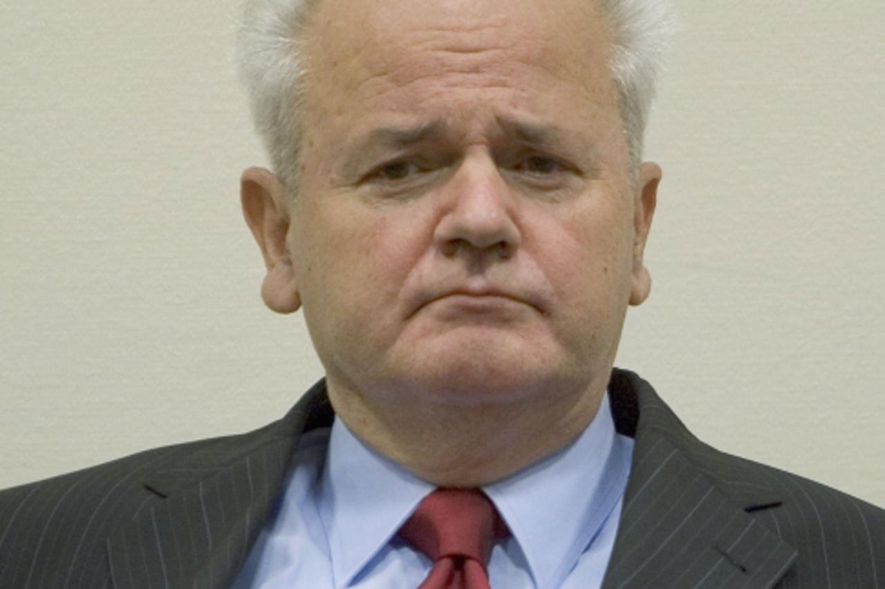 'THE HAGUE, NETHERLANDS - JULY 5:  Former Yugoslav President Slobodan Milosevic appears to defend his case at the war crimes tribunal July 5, 2004  in The Hague, Netherlands  (Photo by Michel Porro/Ge
