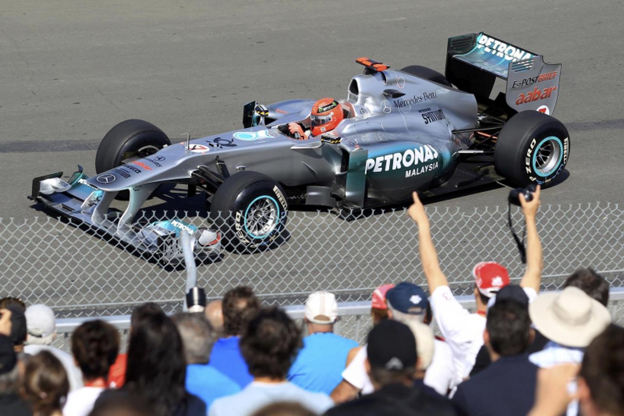 'Mercedes Formula One driver Michael Schumacher competes during the first practice session of the Canadian F1 Grand Prix at the Circuit Gilles Villeneuve in Montreal June 10, 2011.  REUTERS/Christinne