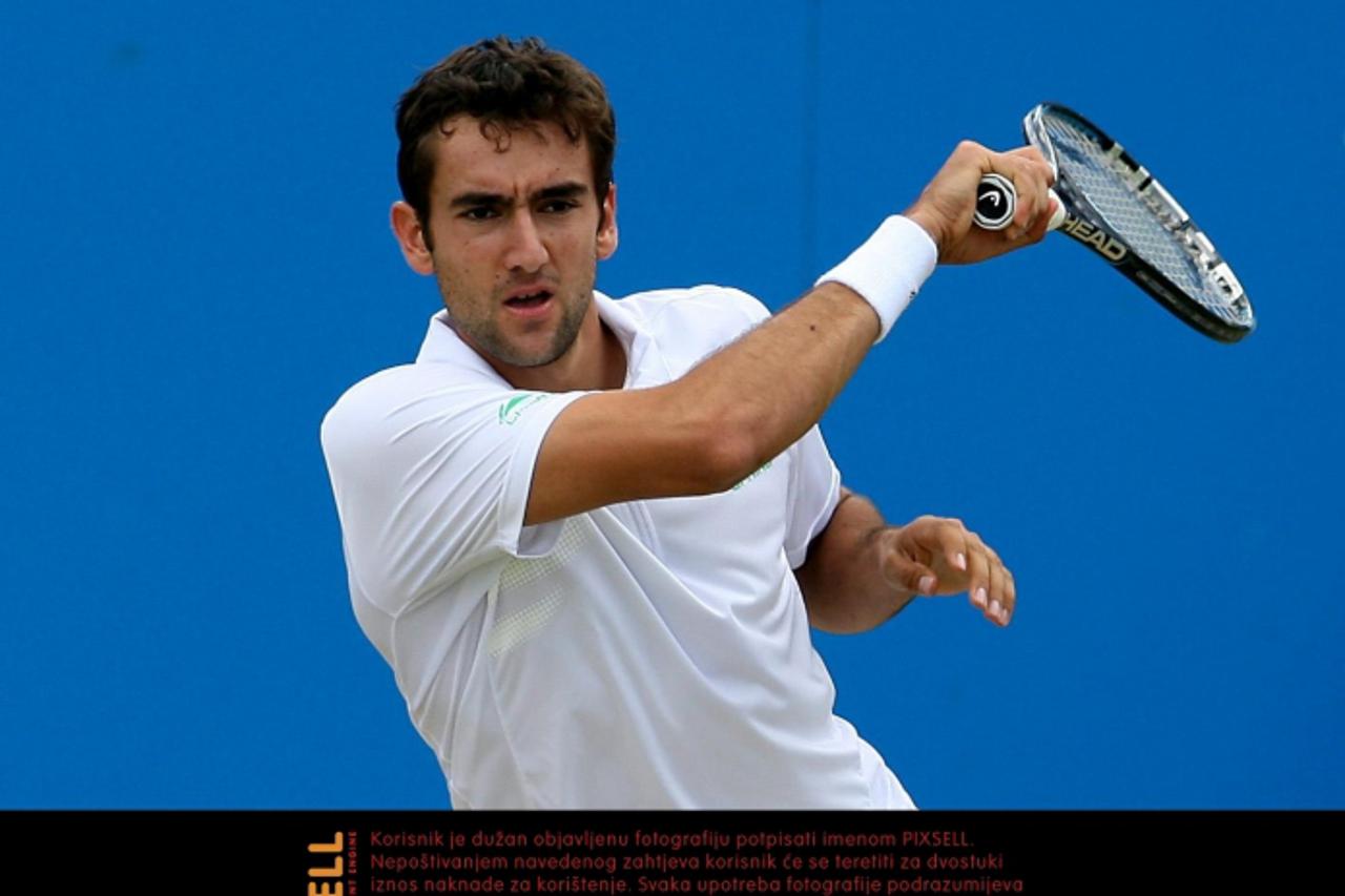 'Croatia\'s Marin Cilic in action against the USA\'s Sam Querrey during day six of the AEGON Championships at The Queen\'s Club, London. Photo: Press Association/Pixsell'