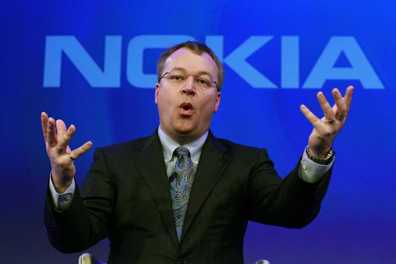 'Nokia chief executive Stephen Elop speaks during a Nokia event in London February 11, 2011. Nokia and Microsoft teamed up to build an iPhone killer on Friday in a desperate attempt to take on Google 