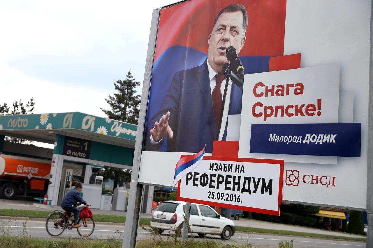 Milorad Dodik, President of Republika Srpska is pictured on an election poster calling for votes for a referendum on their Statehood Day in Prnjavor Milorad Dodik, President of Republika Srpska is pictured on an election poster calling for votes for a ref