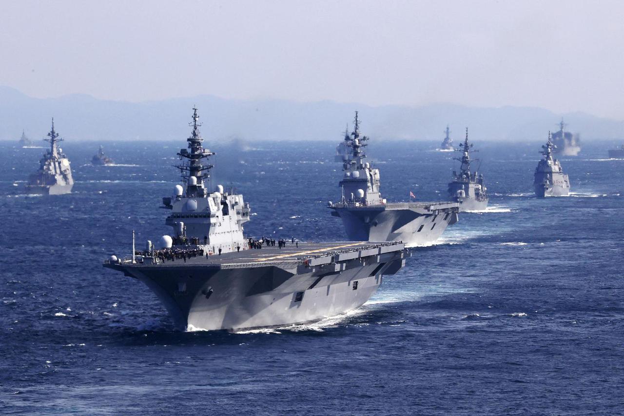 Japan's Maritime Self-Defense Force's destroyer Izumo leads the fleet during the International Fleet Review at Sagami Bay, Japan