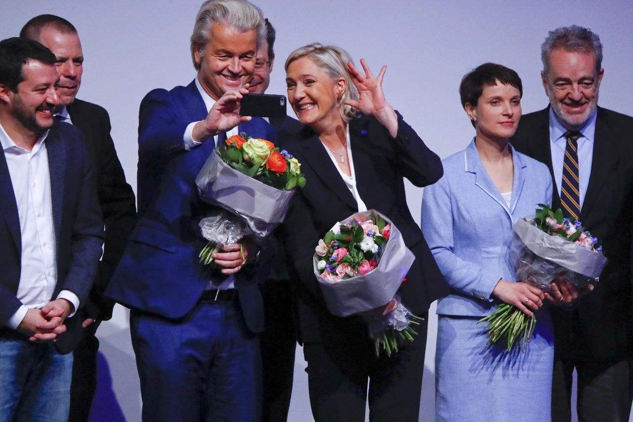 France's National Front leader Marine Le Pen and Netherlands' Party for Freedom (PVV) leader Geert Wilders take a Selfie during a European far-right leaders meeting to discuss about the European Union, in Koblenz, Germany, January 21, 2017.     REUTERS/Wo