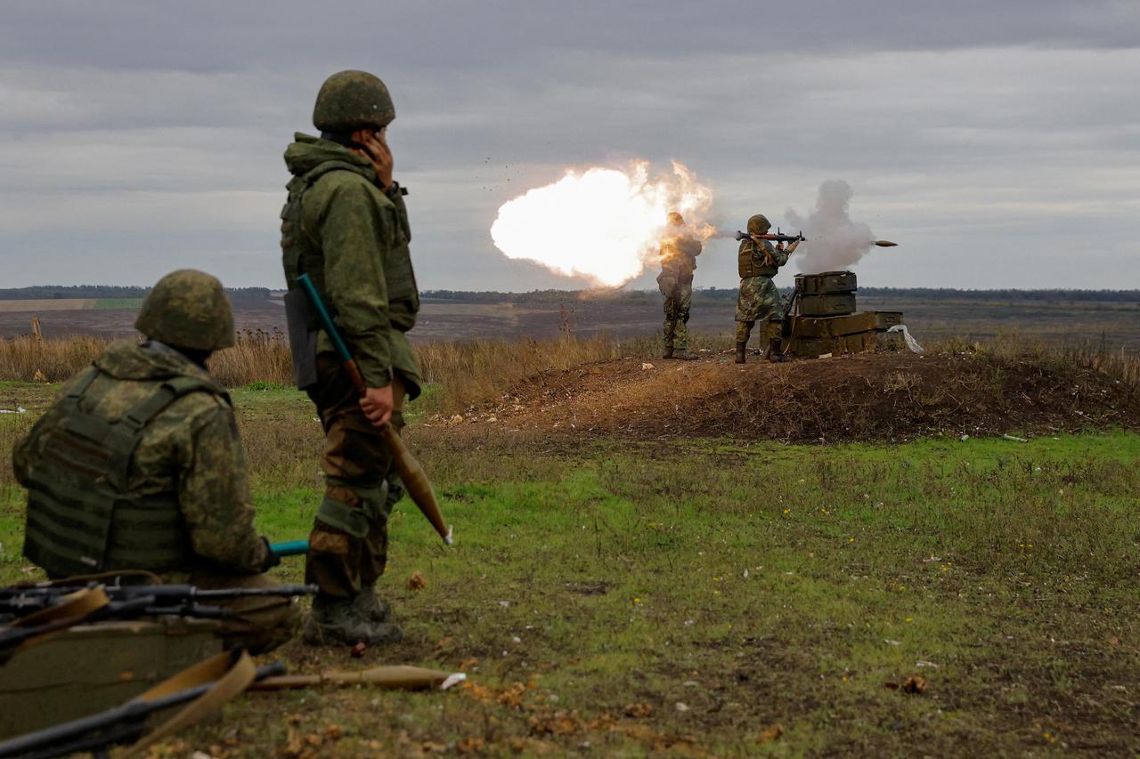 Newly-mobilised Russian reservists take part in a training on a range in Donetsk region