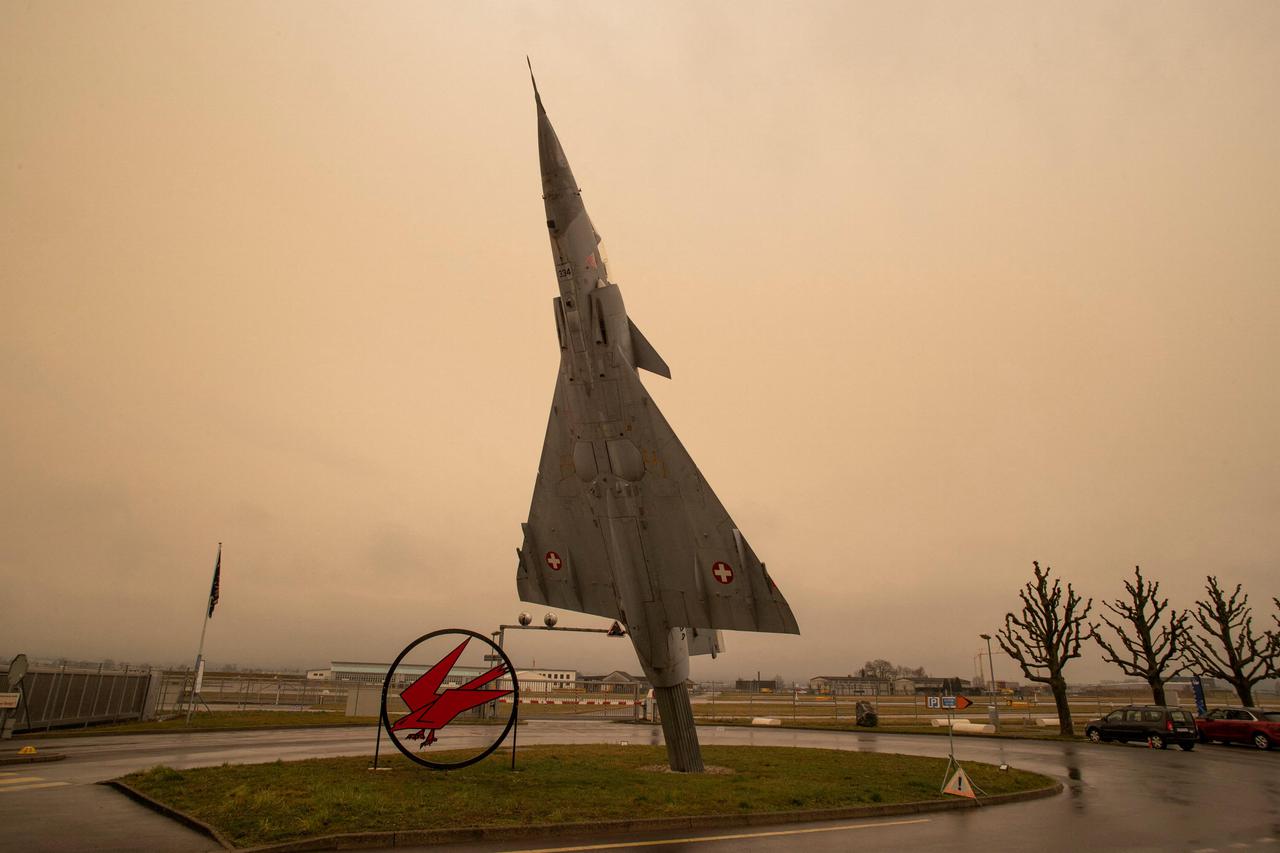 Dust from the Sahara makes the sky misty behind a former Swiss Air Force Mirage 2000 fighter in Payerne
