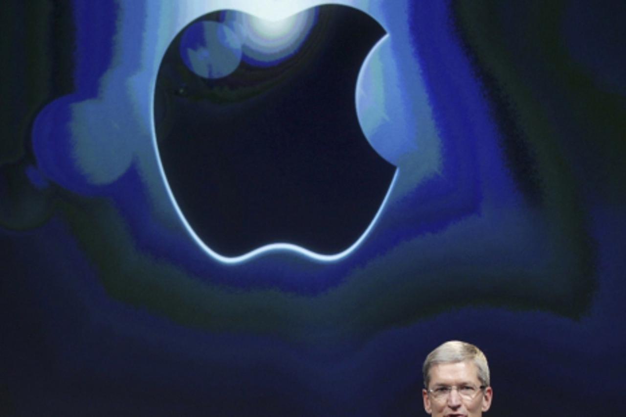 'Apple CEO Tim Cook speaks about the iPhone 4S at Apple headquarters in Cupertino, California October 4, 2011. REUTERS/Robert Galbraith (UNITED STATES - Tags: SCIENCE TECHNOLOGY BUSINESS)'