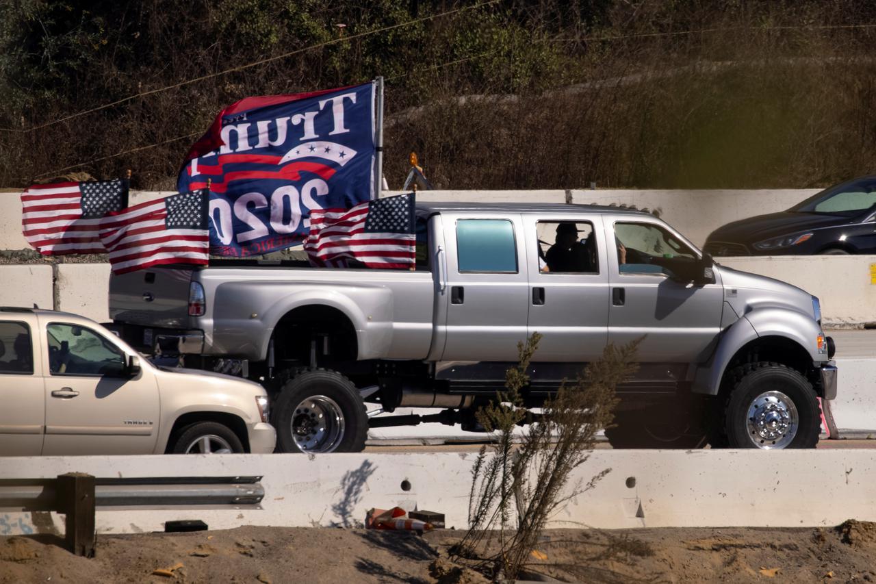 Trump vehicle caravan travels down highway in California