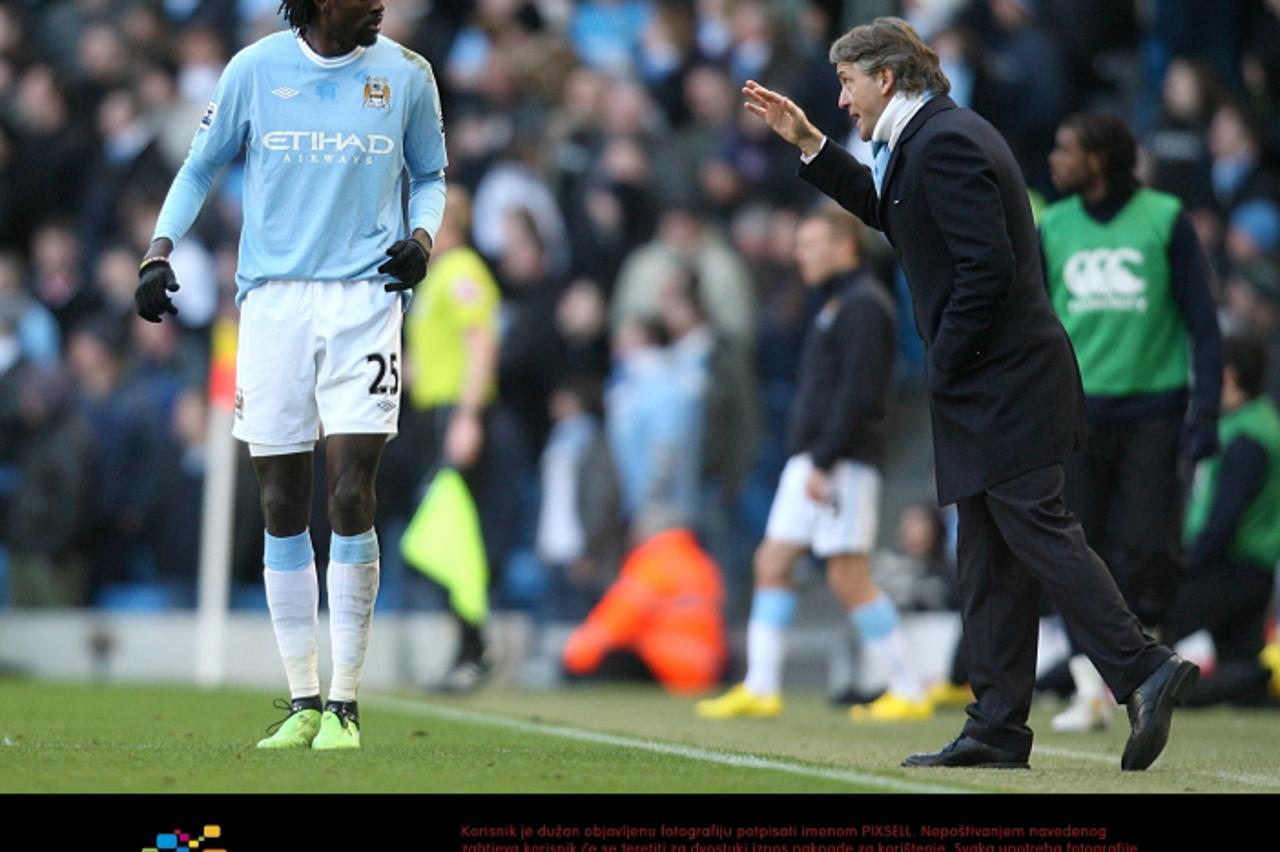 \'Manchester City manager Roberto Mancini gives instructions to Emmanuel Adebayor Photo: Press Association/Pixsell\'