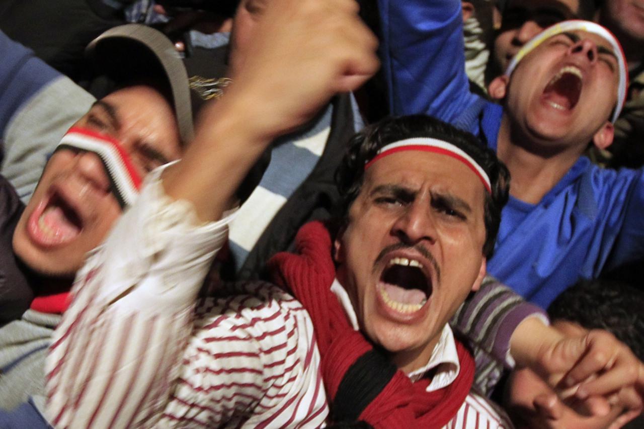 \'Opposition supporters scream in their stronghold of Tahrir Square, in Cairo February 10, 2011. Egyptian President Hosni Mubarak is on the verge of capitulating to protester demands to give up power 