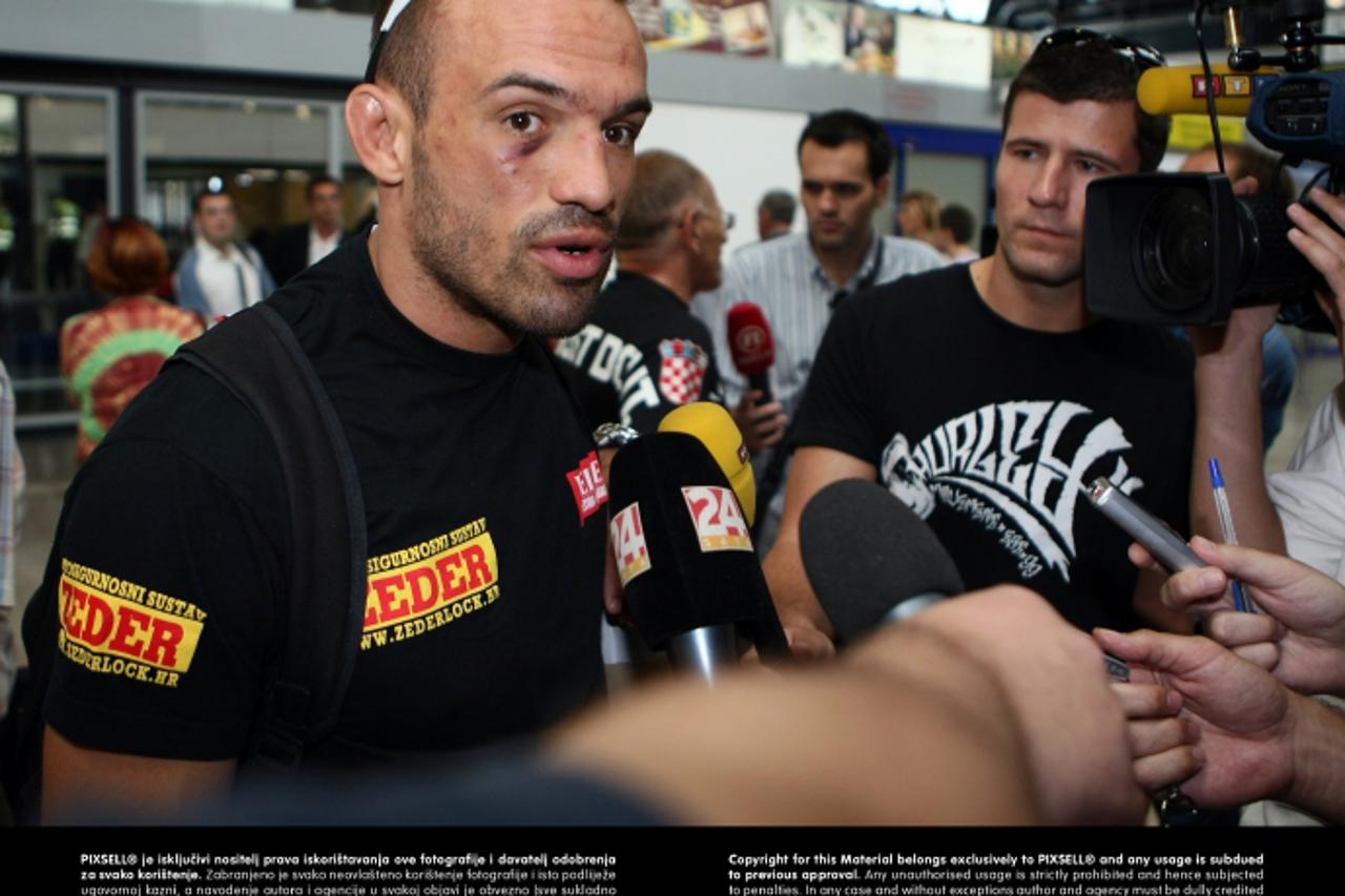 '21.09.2009., Zagreb - Povratak Mirka Filipovica sa UFC 103 turnira u Zagreb. Suborac i sparing partner Igor Pokrajac.  Photo: Jurica Galoic/24sata'