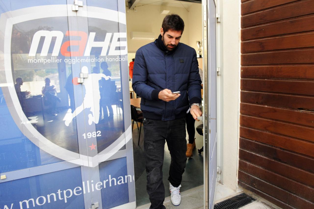 'French handball player of Montpellier Nikola Karabatic, suspected of match-fixing and illegal betting, leaves the Montpellier handball club\'s headquarters in Montpellier, in southern France, on Octo