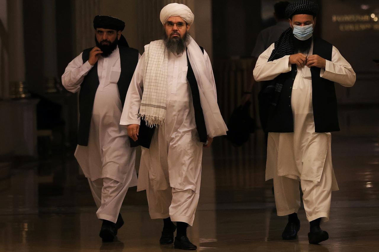 Members of Taliban political office attend a news conference in Moscow