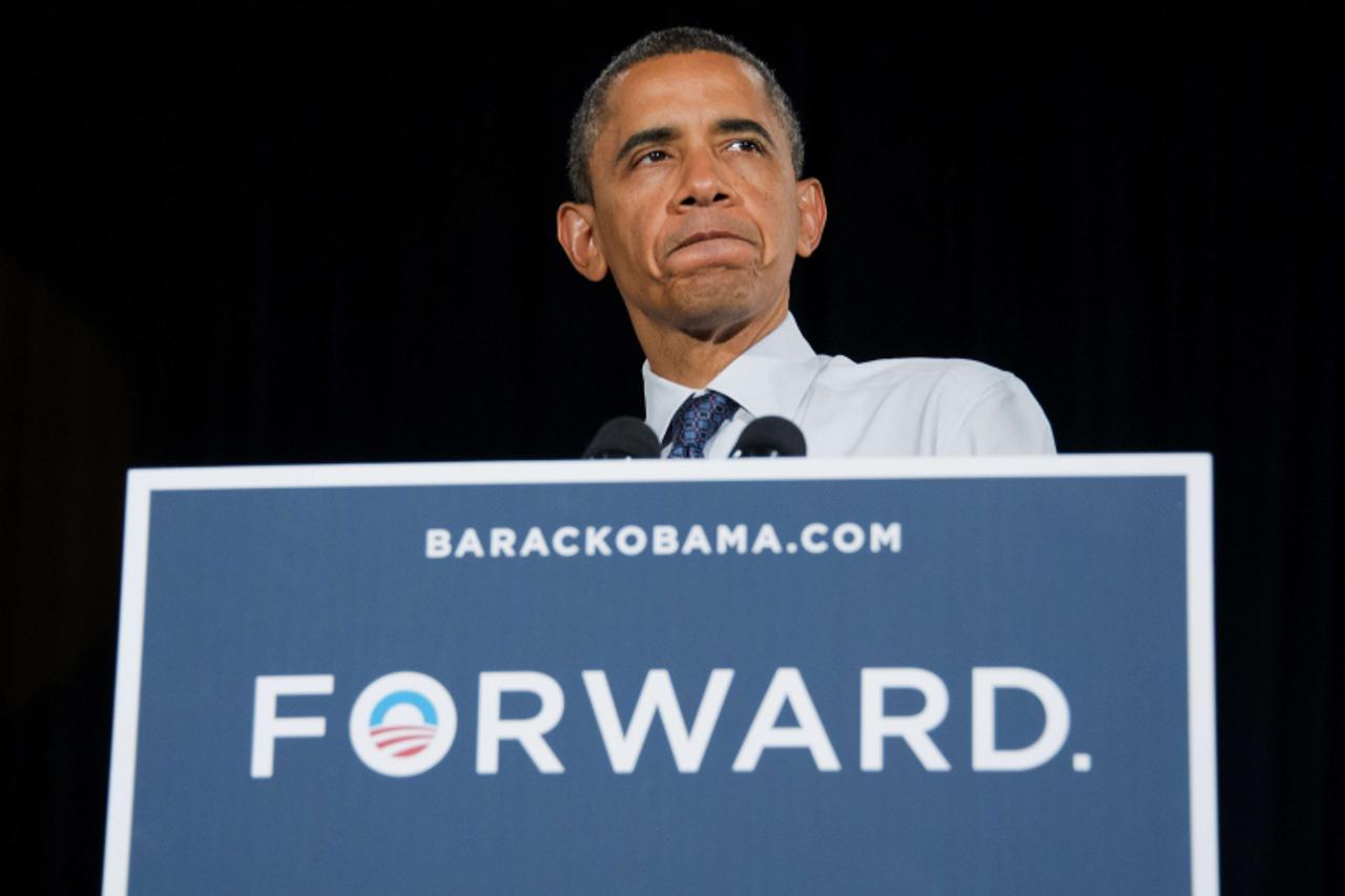 'US President Barack Obama delivers remarks at a campaign event in Akron, Ohio, August 1, 2012.    AFP PHOTO/Jim WATSON'