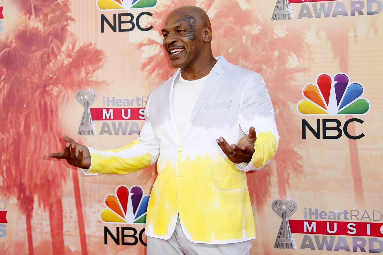 Boxer Mike Tyson poses at the 2015 iHeartRadio Music Awards in Los Angeles, California, March 29, 2015. REUTERS/Danny Moloshok