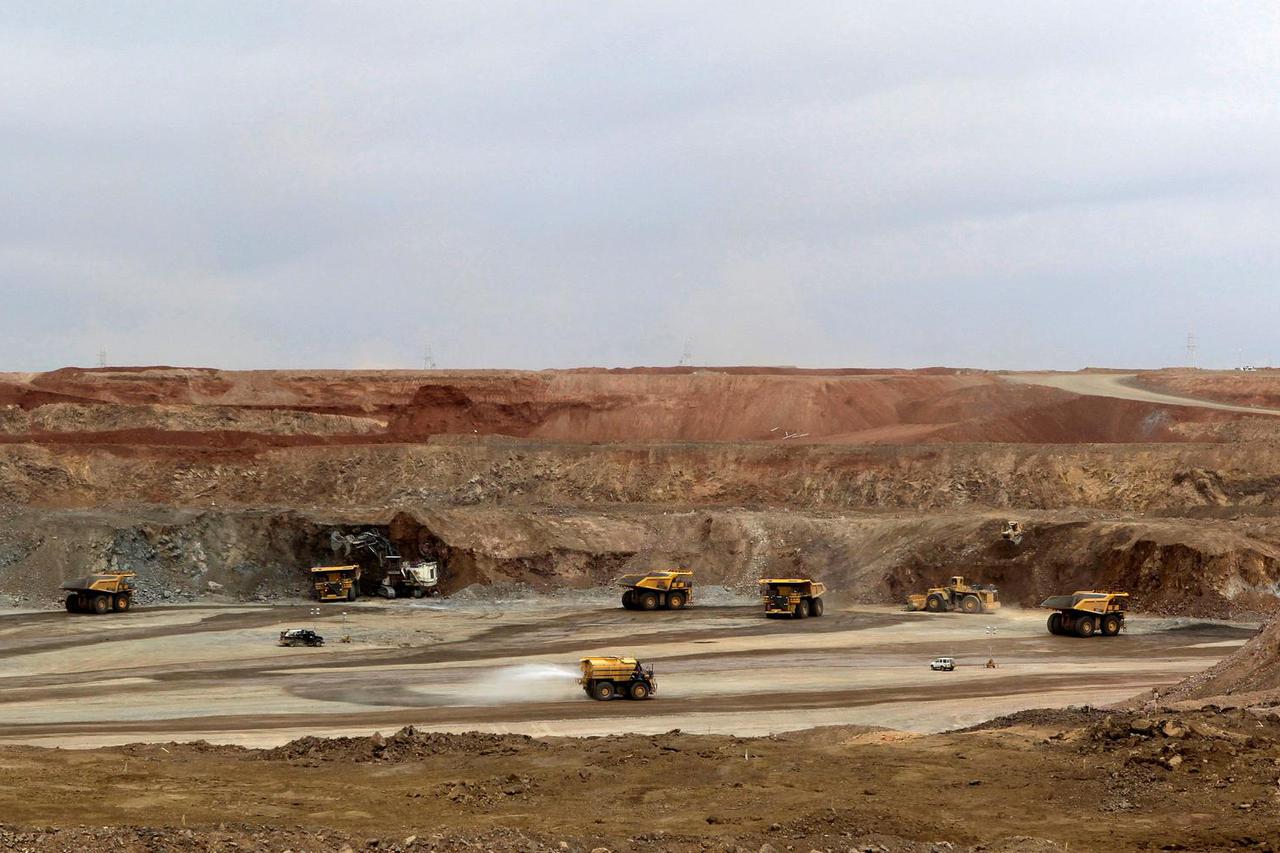 FILE PHOTO: Mining trucks are seen at the Oyu Tolgoi mine in Mongolia's South Gobi region