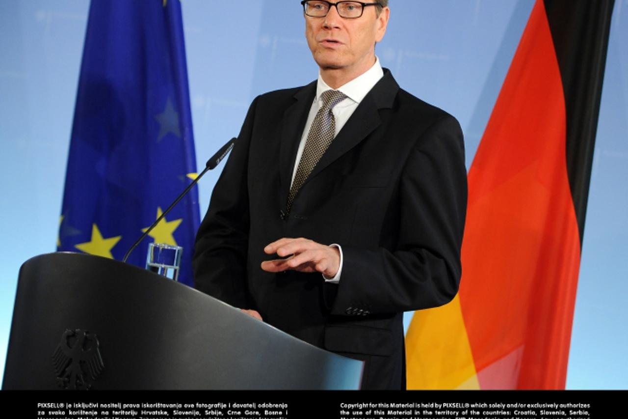 'Germany\'s Foreign Minister Guido Westerwelle gives a press statement after talks with High Representative of the Union for Foreign Affairs and Security Policy Ashton in Berlin, Germany, 01 February 