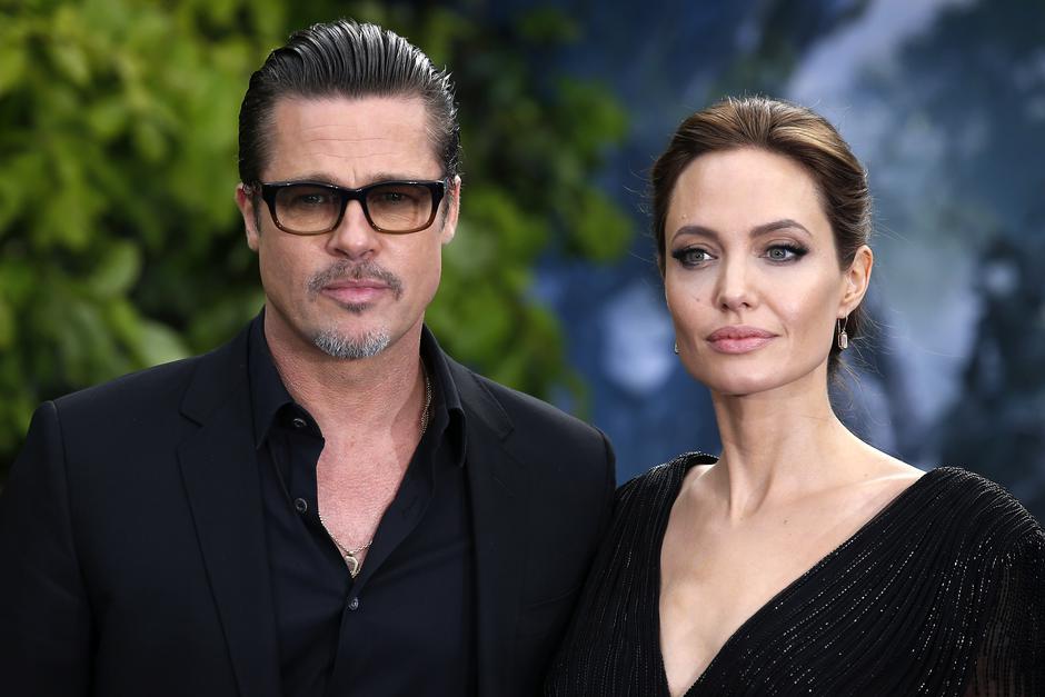 Brad Pitt and Angelina Jolie divorce File photo dated 08/05/14 of Brad Pitt and his wife Angelina Jolie attending the premiere of Maleficent at Kensington Palace, London, as Hollywood star Jolie has filed for divorce, TMZ has reported. Justin Tallis  Phot